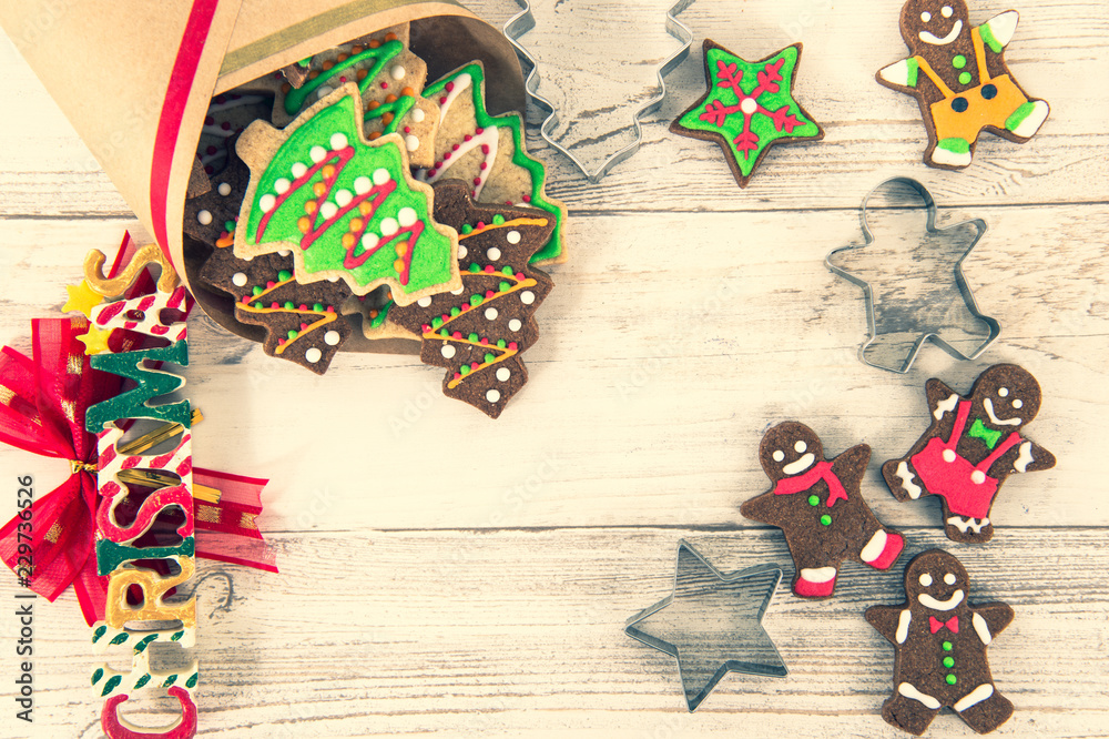 Beautiful Christmas composition and decoration with baked Christmas gingerbread cookies in paper bag