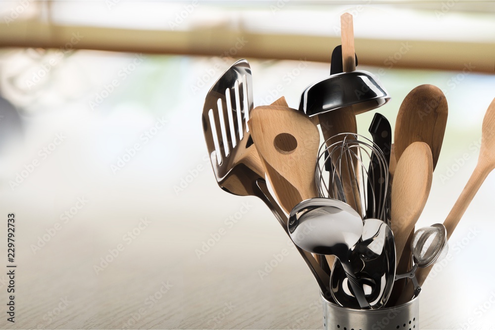 Set of kitchen utensils on background