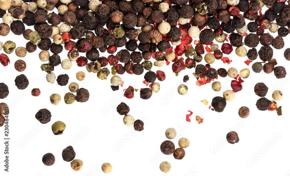 Mix of different peppers isolated on white background (black, red, green and white peppercorns)