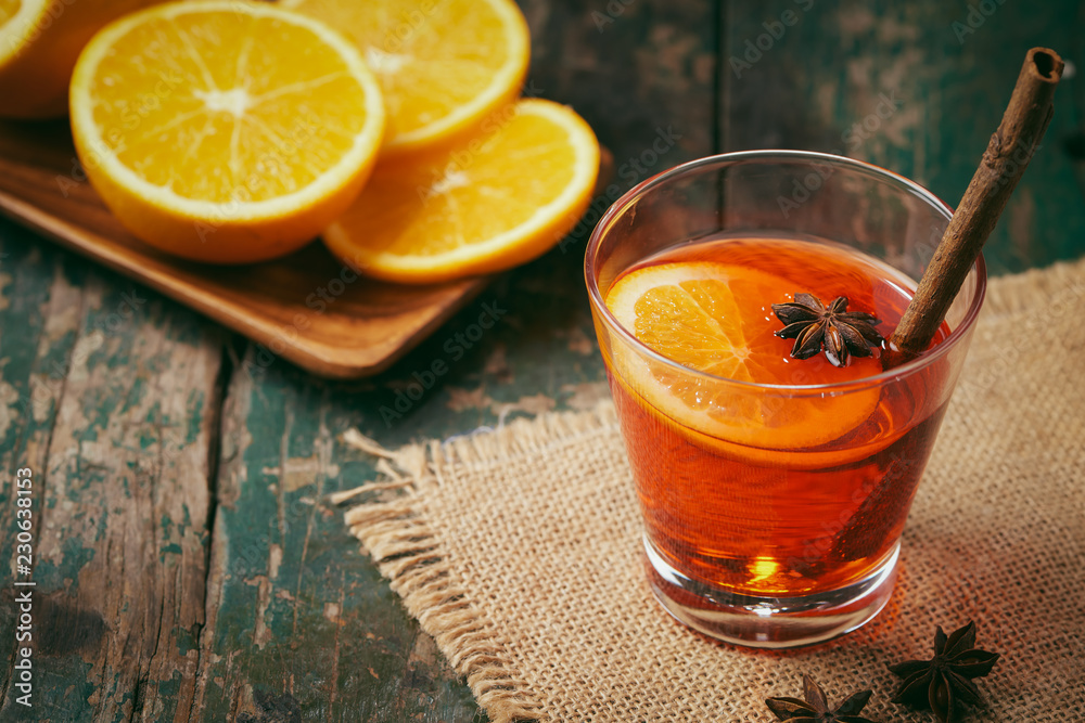 Christmas mulled wine on a rustic wooden table. Holidays concept.