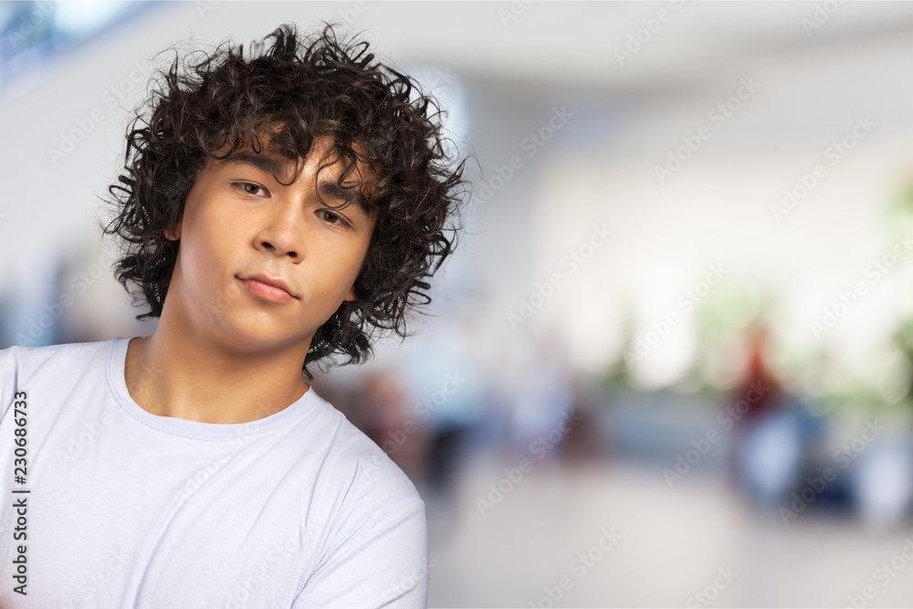 Smiling handsome boy  on  background