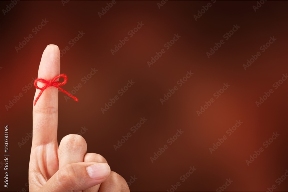 Rope bow on finger pointing up on