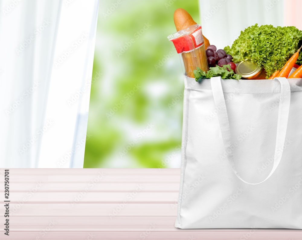 Full shopping  bag, isolated over  background