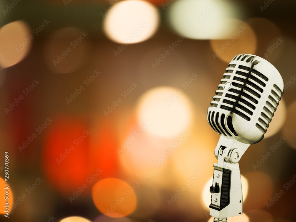 Retro style microphone on  background