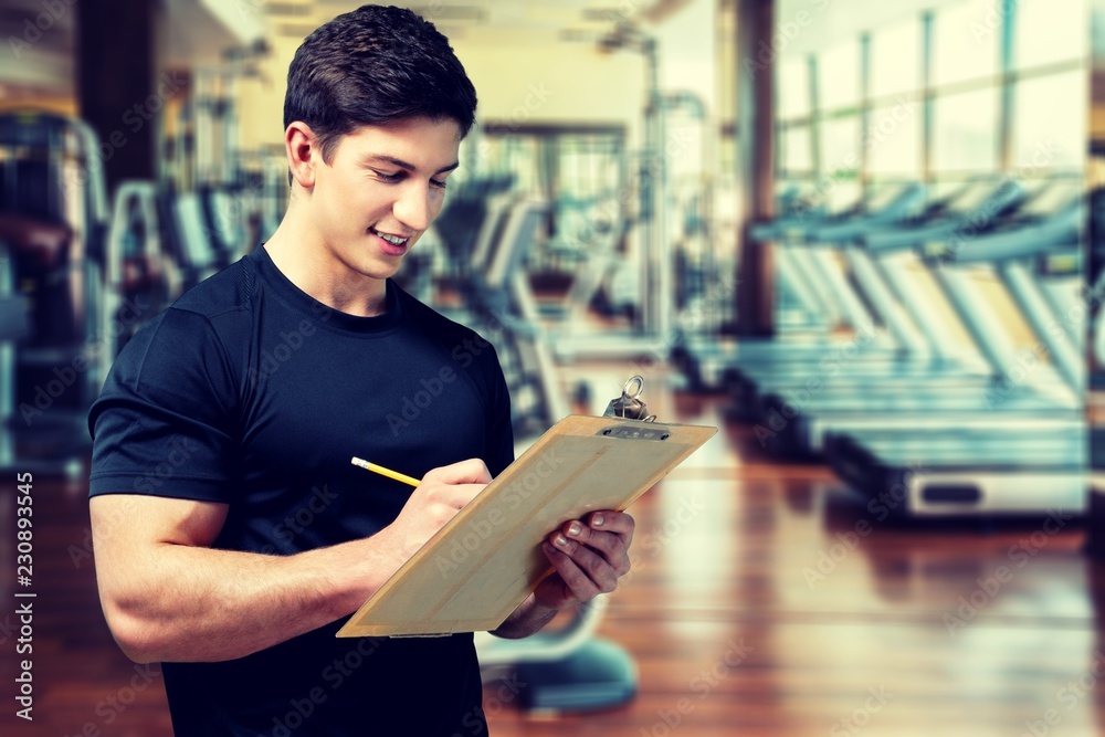 Young man with notebook report