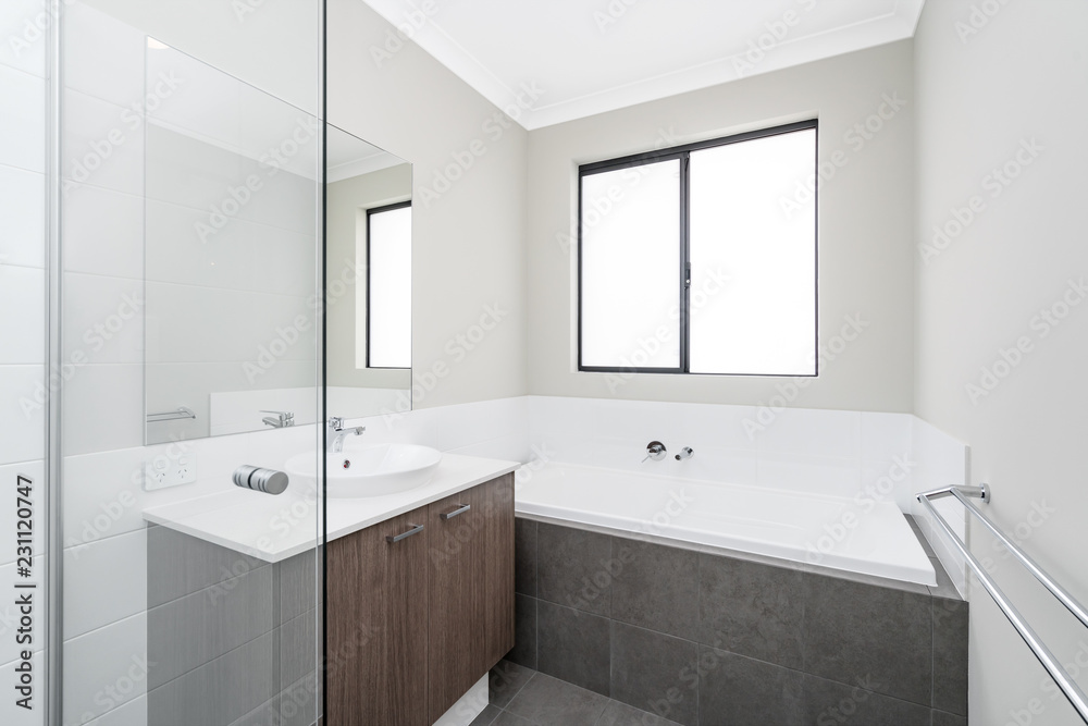 Modern style large bathroom in new Australian home.