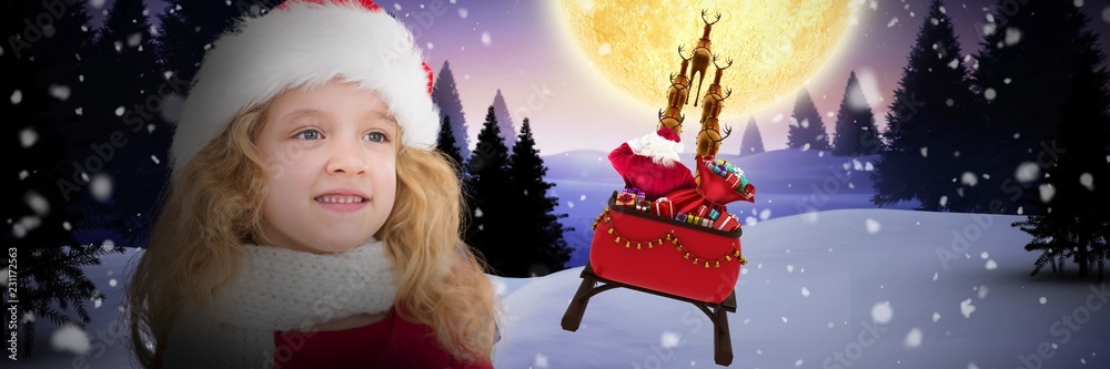 Composite image of cute girl in santa hat