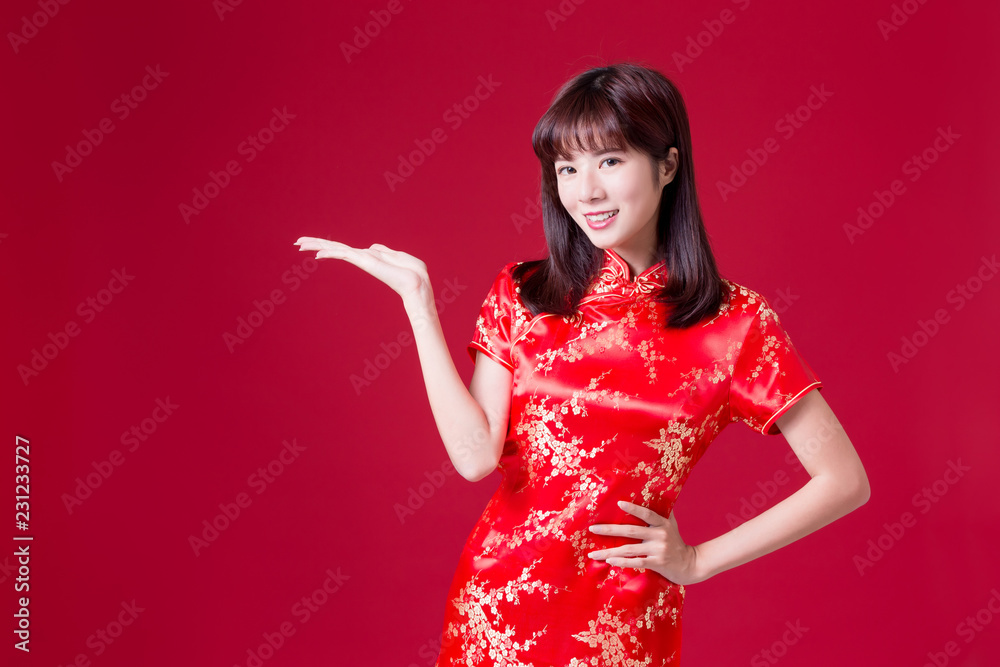 woman show something with cheongsam