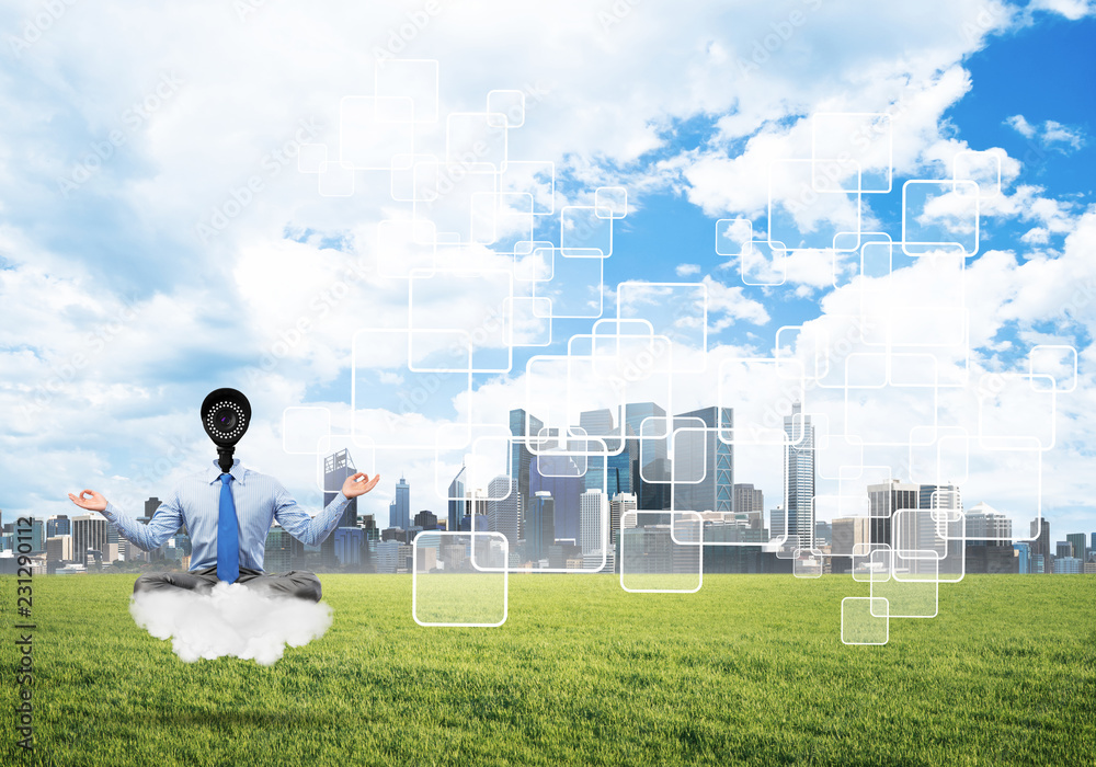 Camera headed man sitting in lotus pose on cloud against modern cityscape