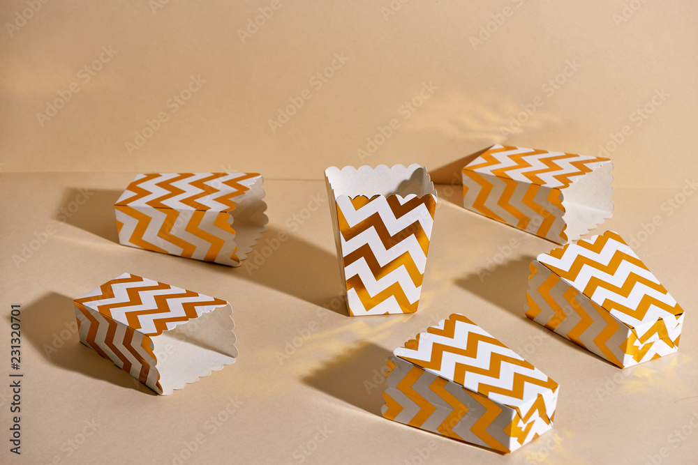 Empty paper golden Christmas cups for winter holidays meetings with friends with New Years Christmas