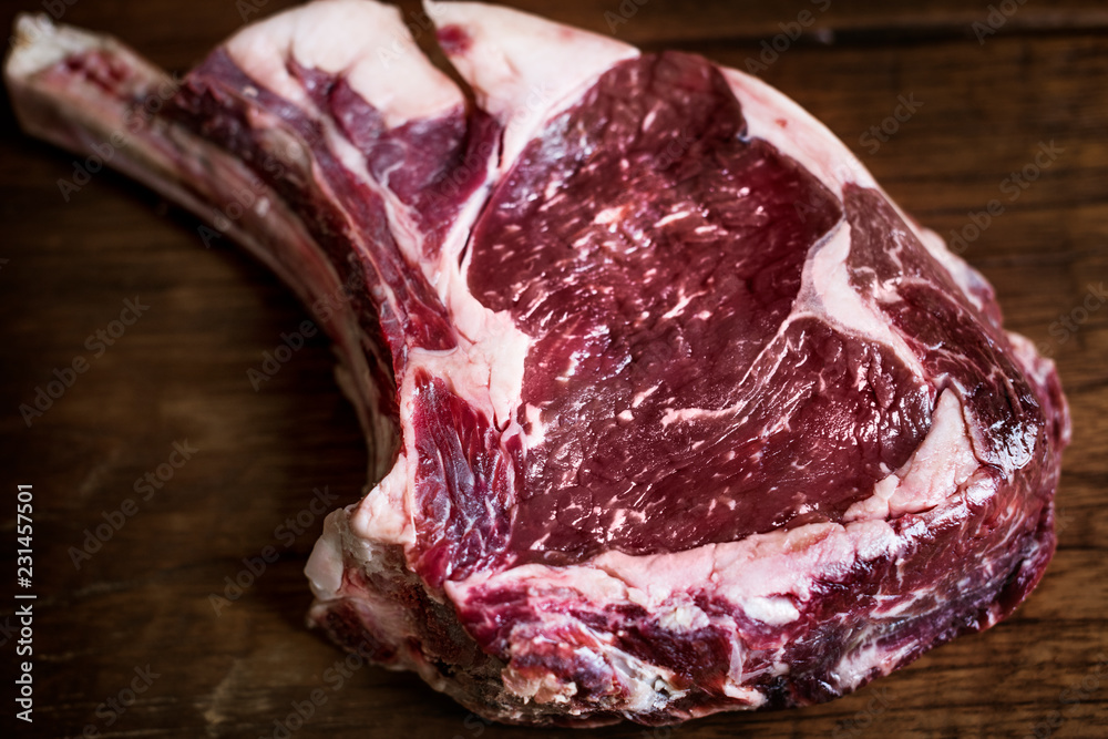 Cut of fresh rib eye steak food photography recipe idea