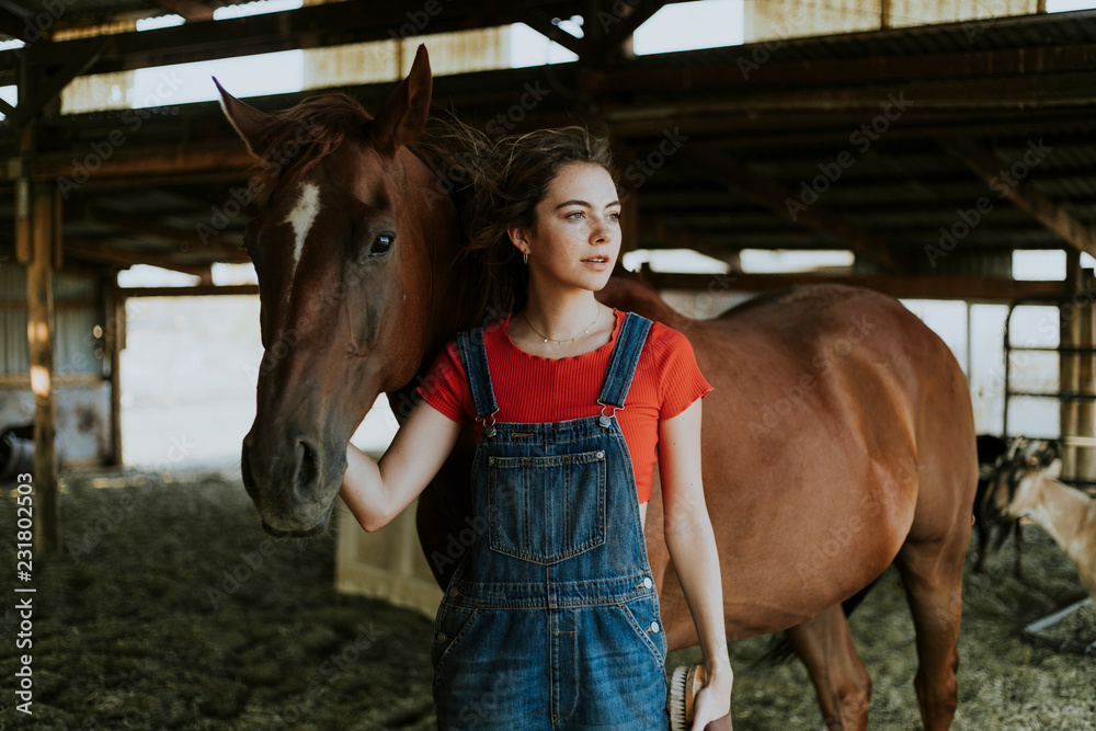 Portrait of a girl and a horse