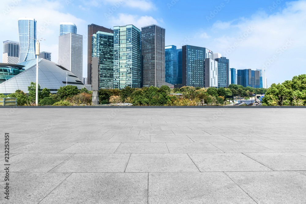 Blue sky, empty marble floor and skyline of Hangzhou urban architecture.