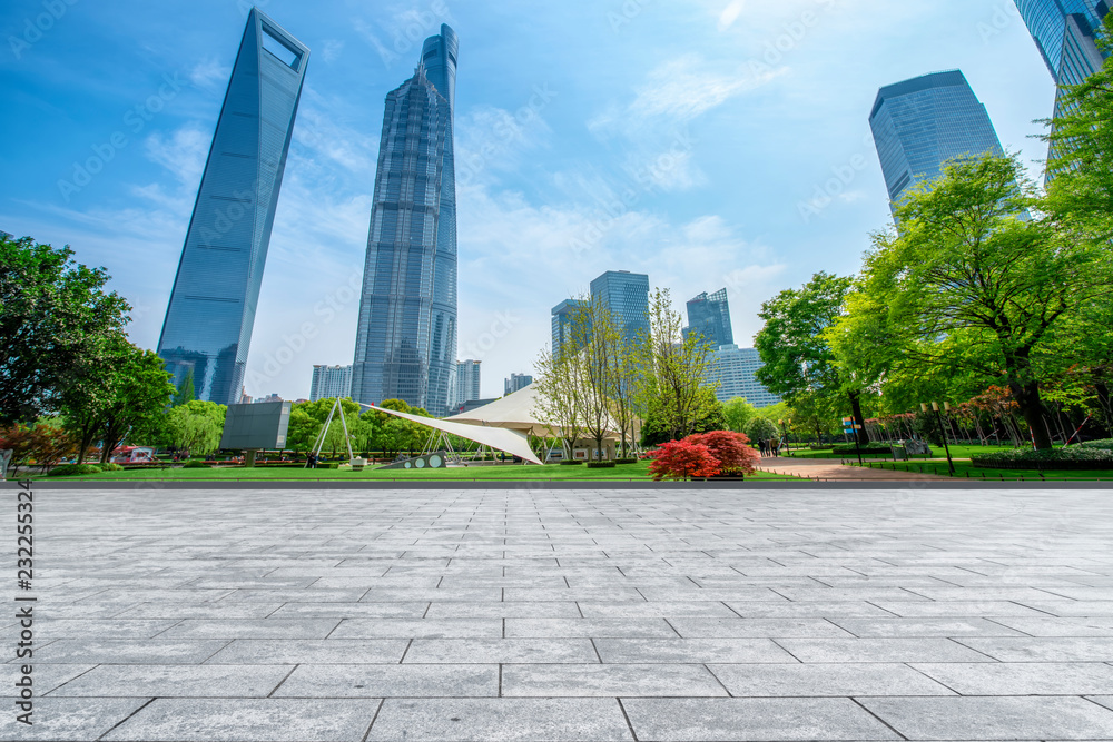 Blue sky, empty marble floor and skyline of Shanghai urban architecture.