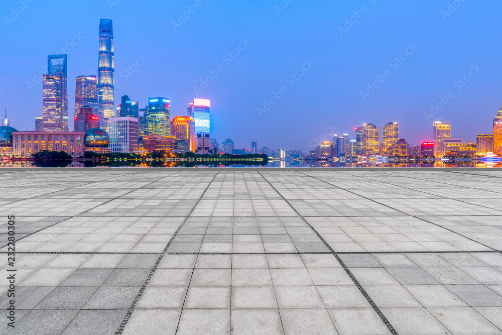 Blue sky, empty marble floor and skyline of Shanghai urban architecture.