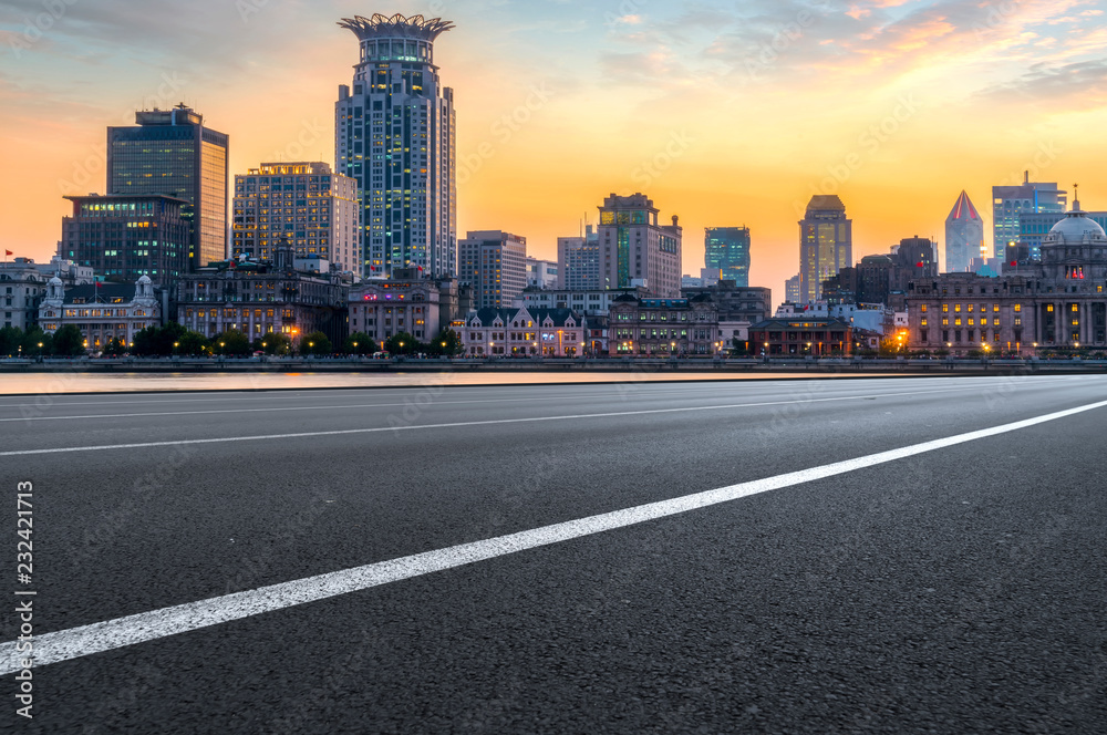 City skyscrapers and road asphalt pavement