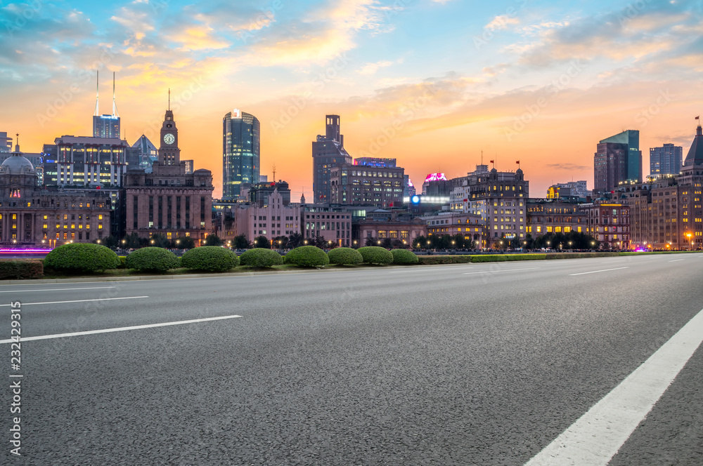 City skyscrapers and road asphalt pavement