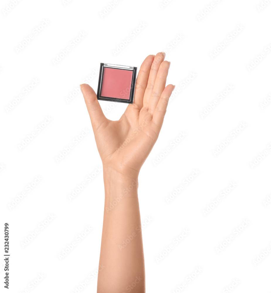 Woman holding blusher on white background