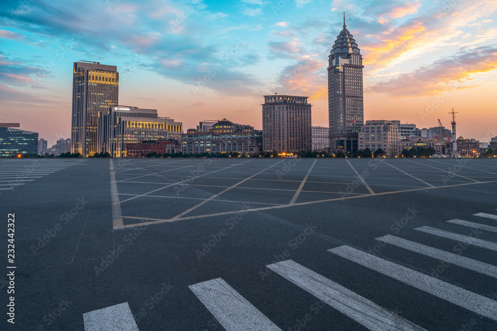 City skyscrapers and road asphalt pavement