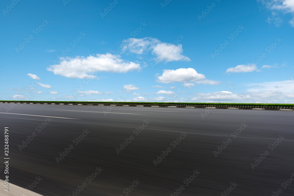 Empty highway asphalt pavement and sky cloud landscape..