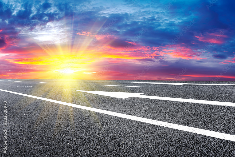 Empty highway asphalt pavement and sky cloud landscape..