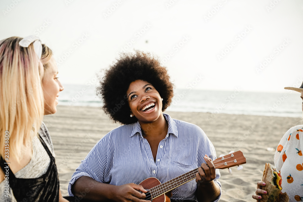 Musicians having a beach picnic