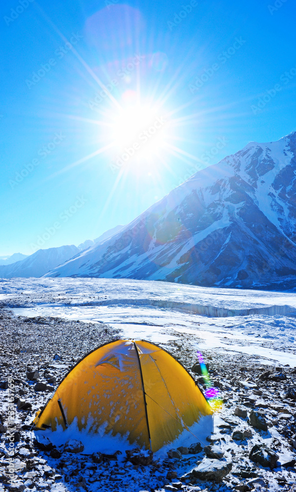 Tents of climbers high in the mountains. Extreme sport concept