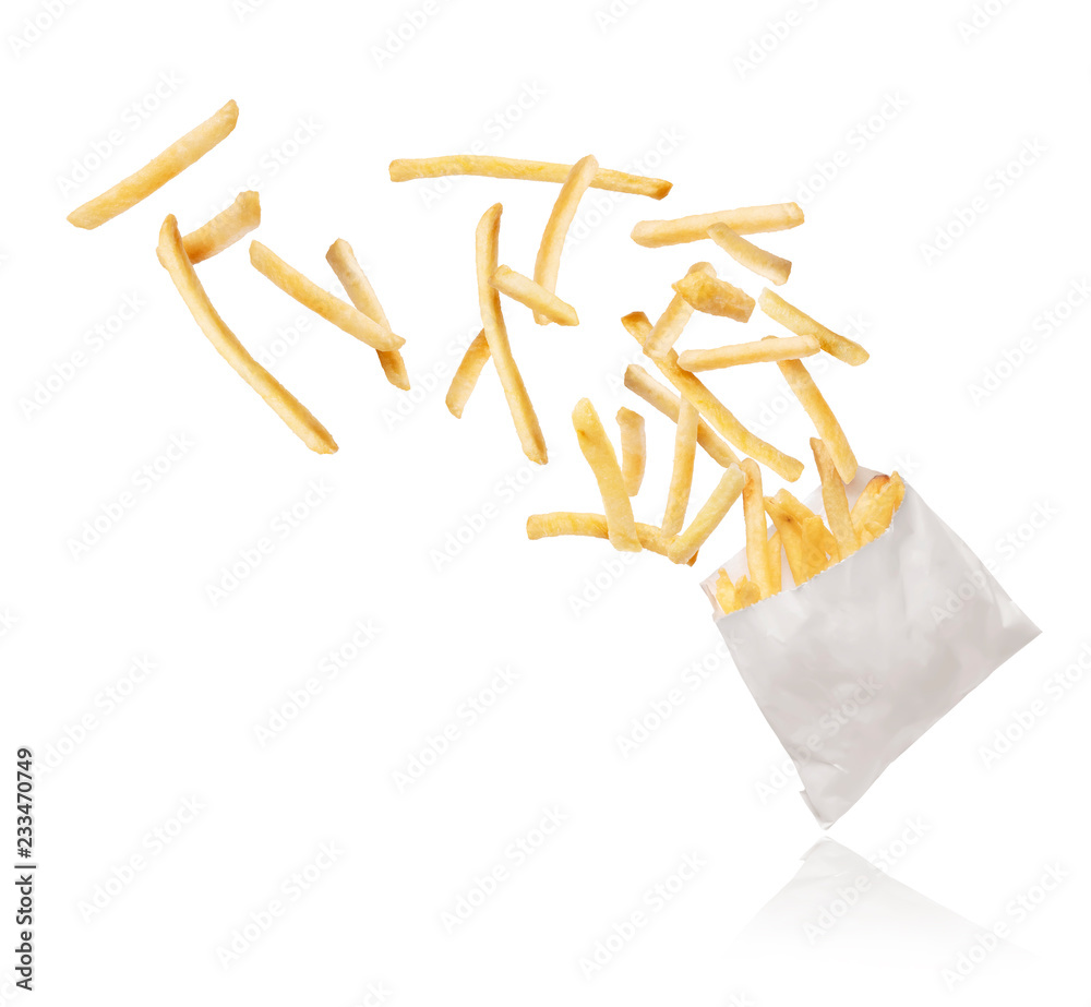 French fries flying out of paper packaging on white background