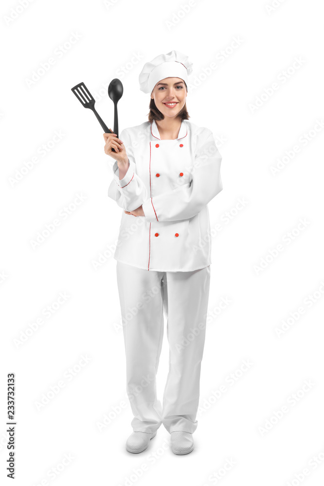 Young female chef with kitchenware on white background