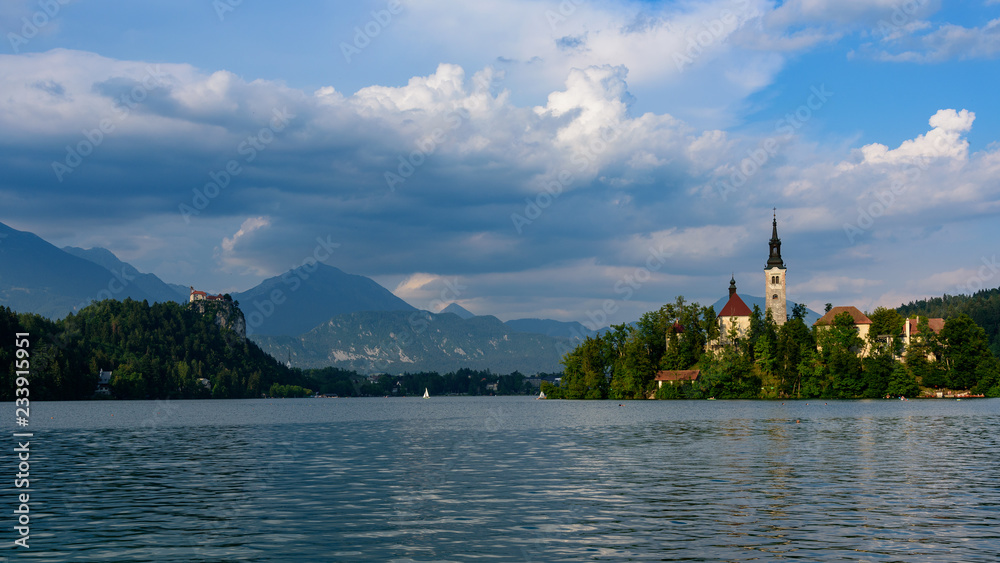 Iconic landscape view of beautiful St. Marys Church of Assumption on small island,lake Bled in Slove