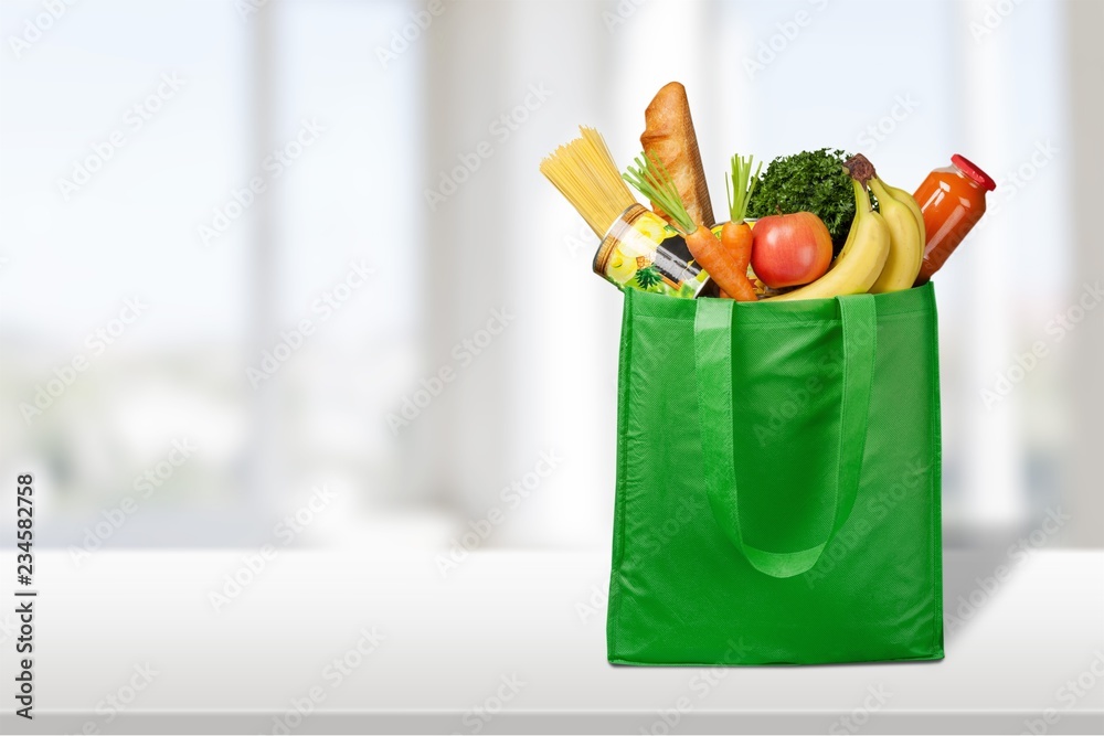 Full shopping  bag, isolated over  background