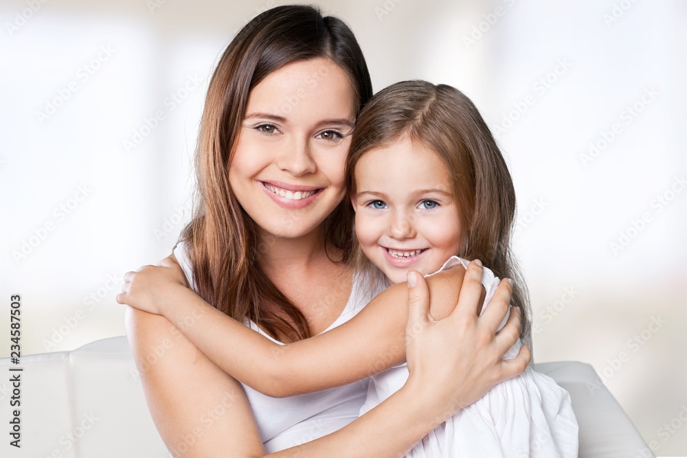 Happy Mother and daughter hugging