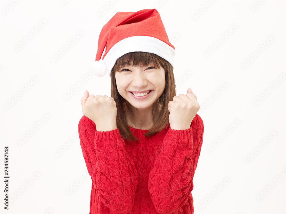 女性　クリスマス　ガッツポーズ