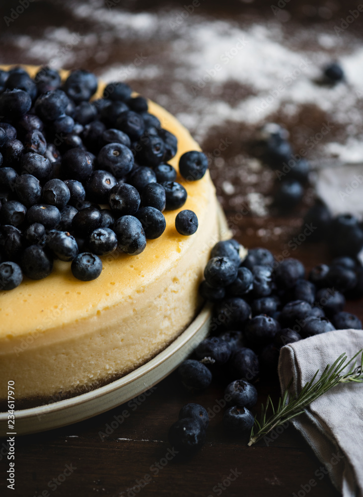 Closeup of a cheesecake decorated with blueberries