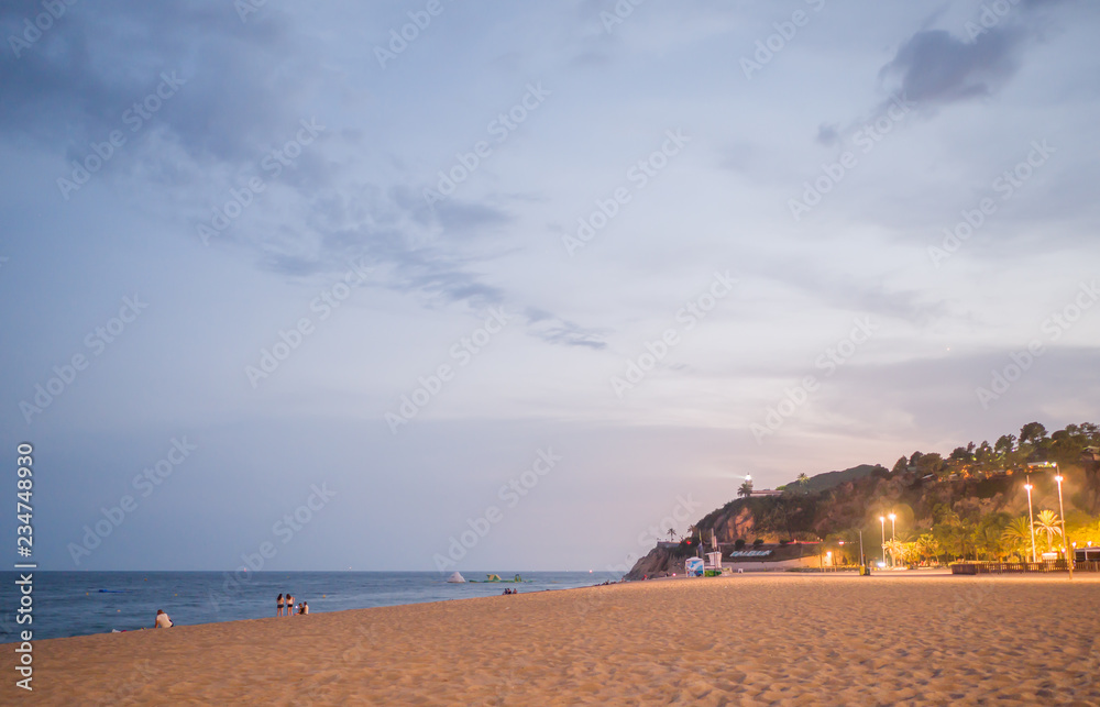 Evening time on the beach in Calella. Calella de Palafrugell night landscape in Costa Brava, Spain.