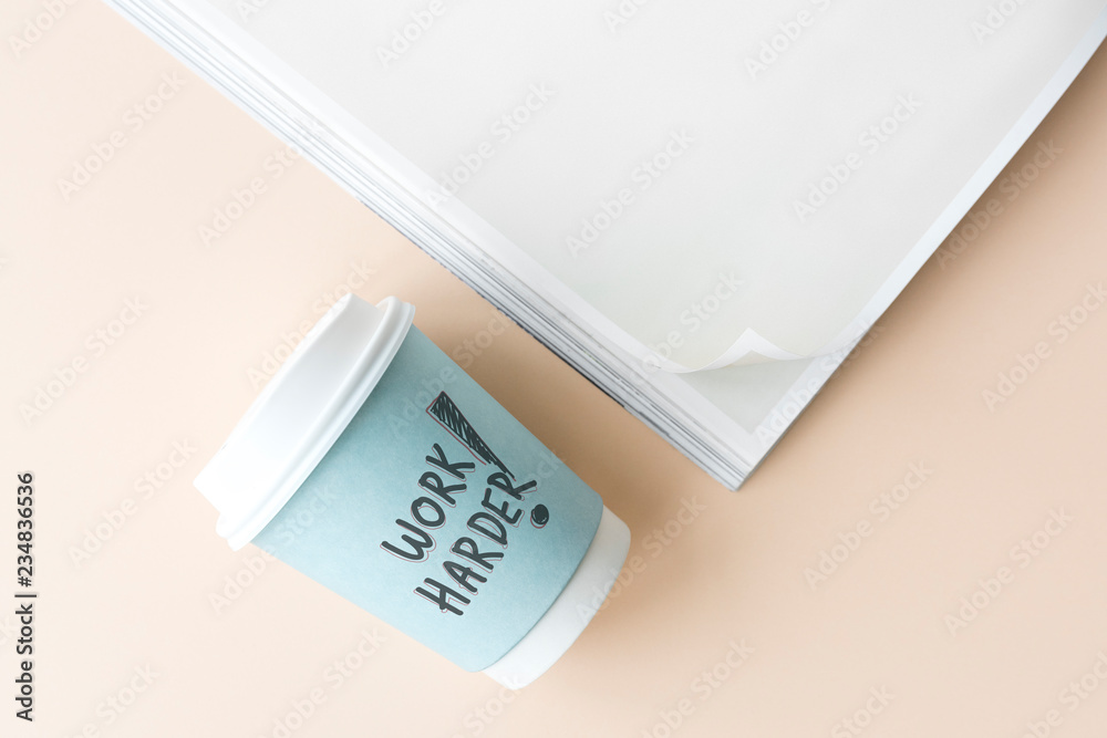 Work harder written on a paper cup