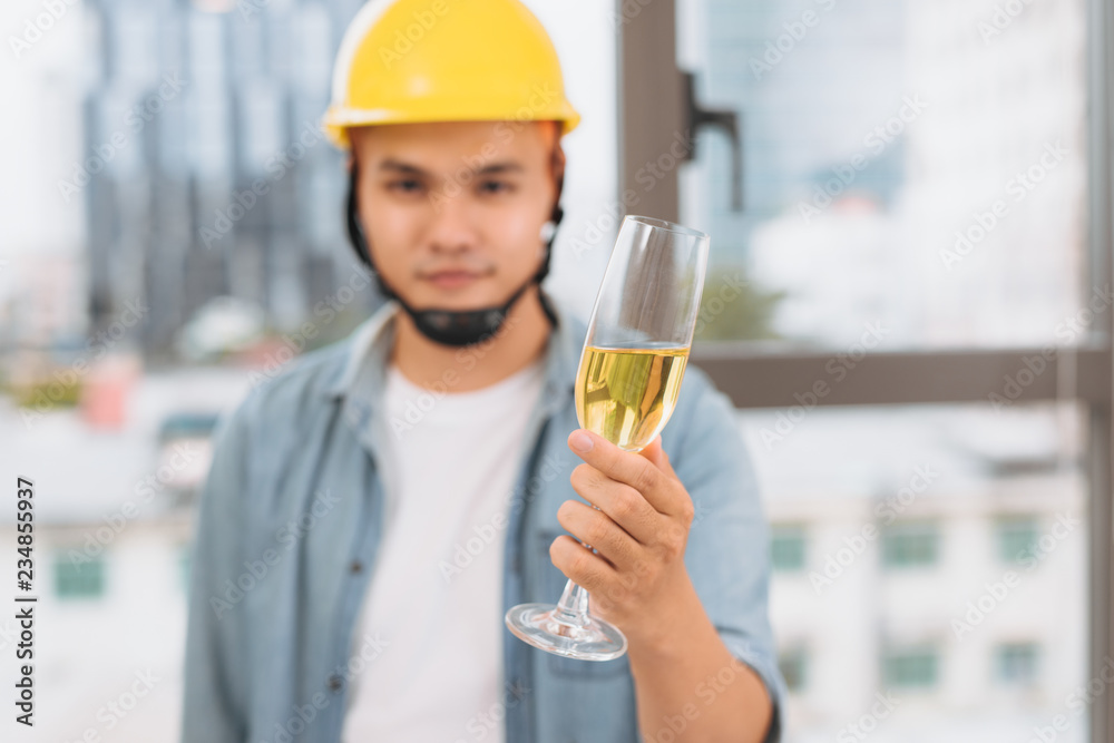 architects drinking champagne in the office