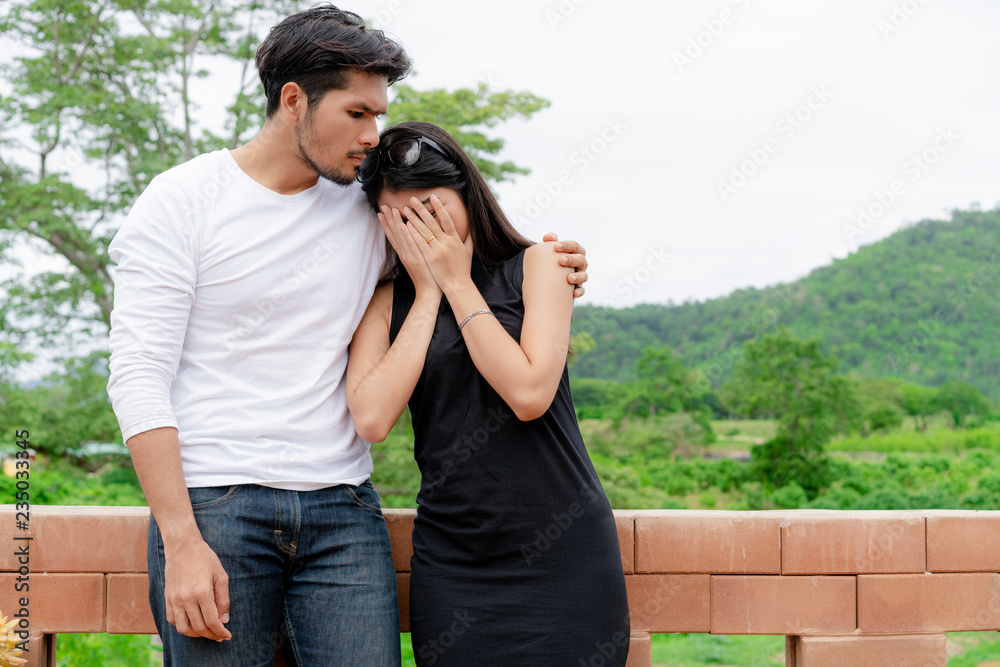 The unhappy couple of man and woman.