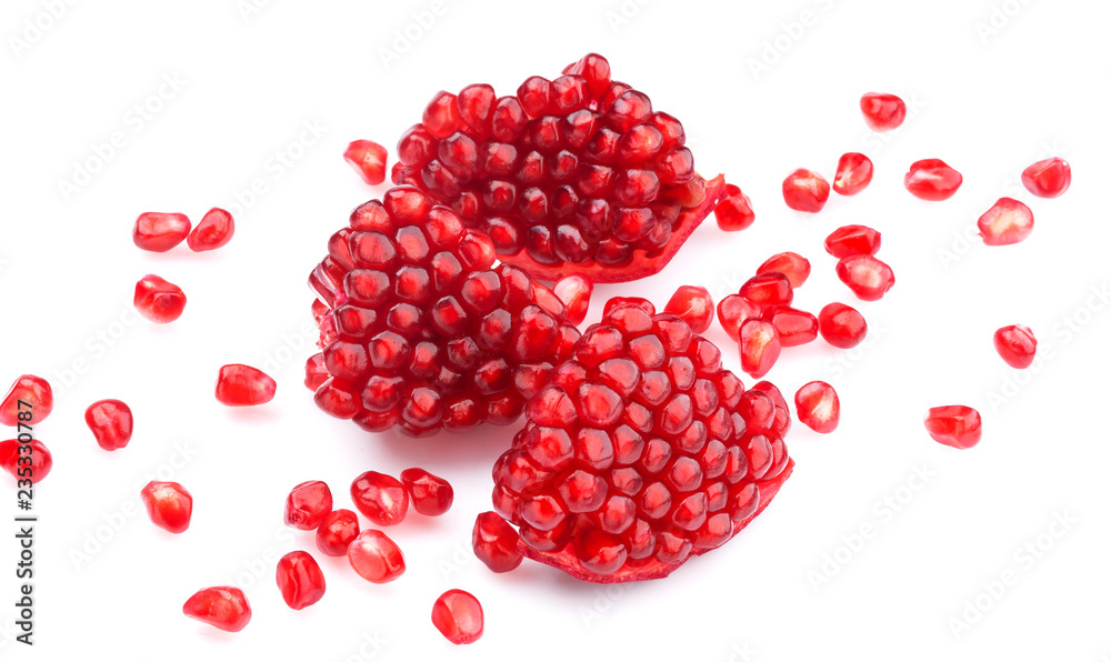 Ripe pomegranate seeds isolated on white