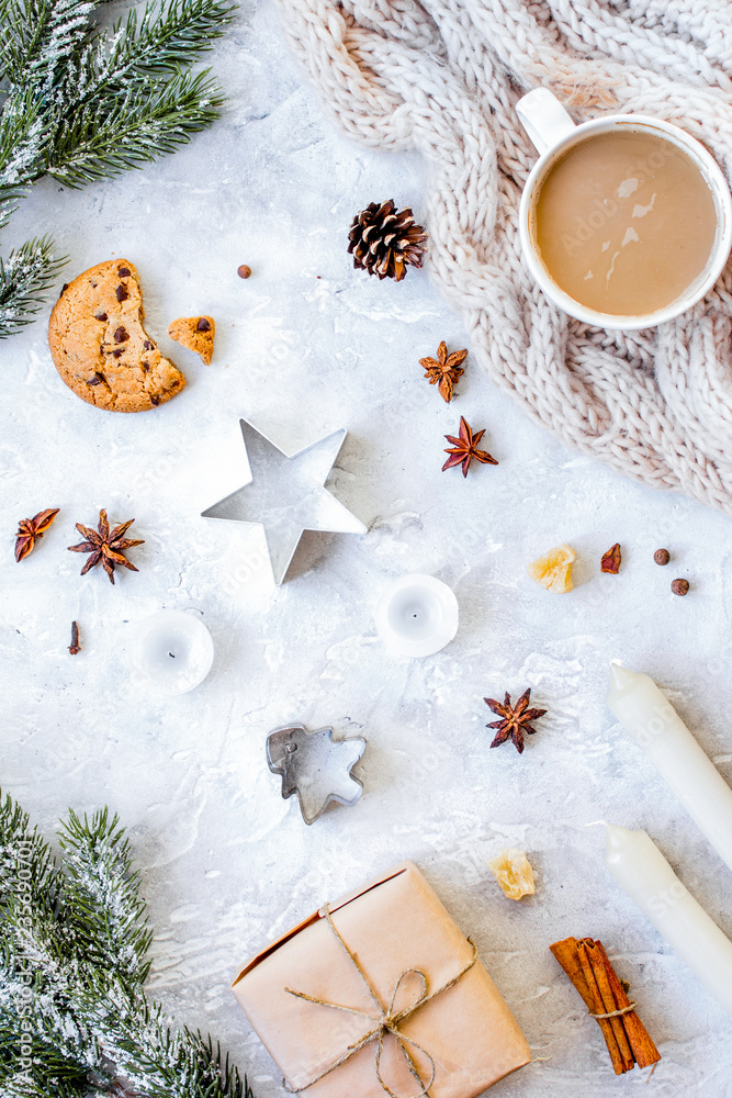 Christmas evening with cup of cocoa white background top view