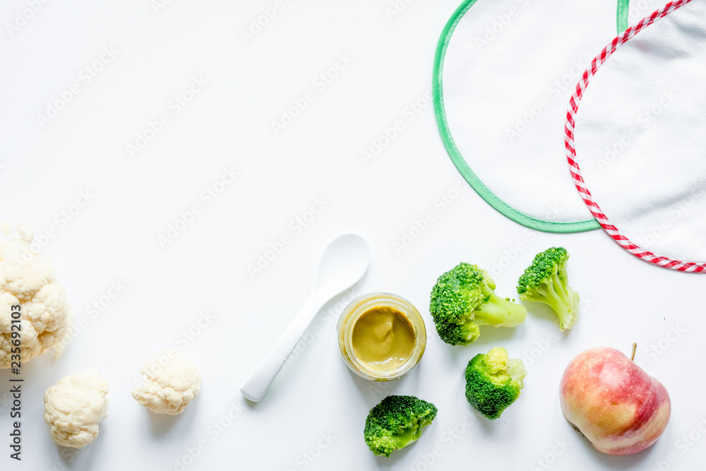 cooking vegetable puree for baby on white background top view