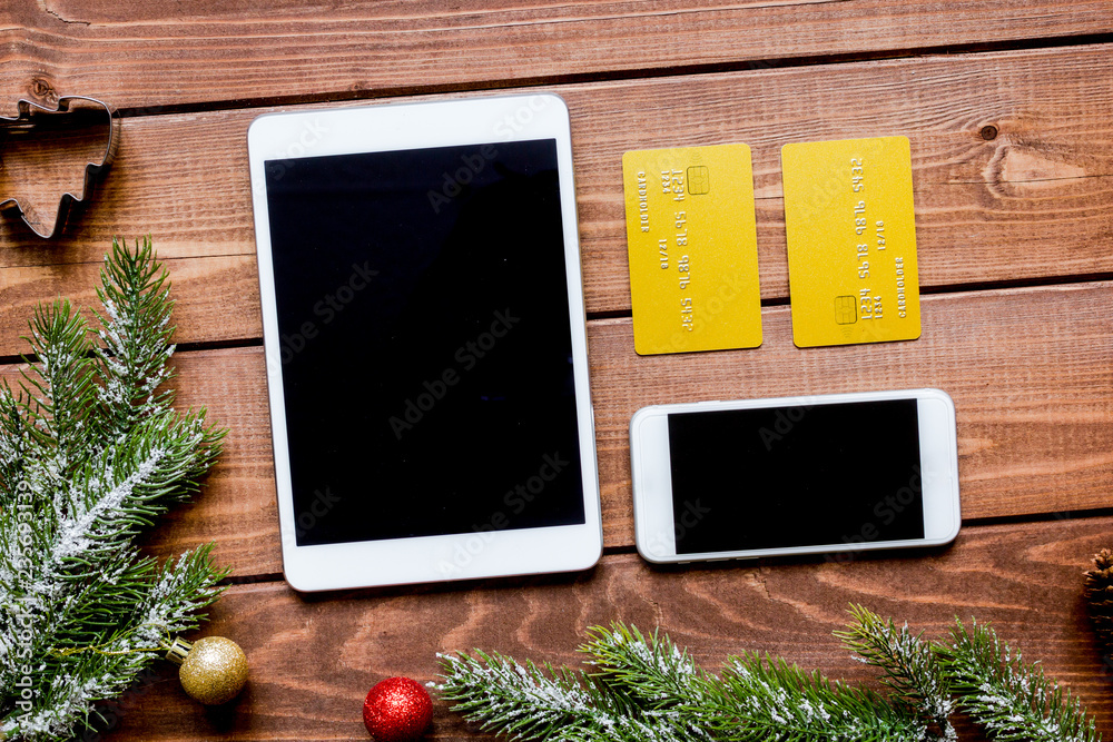 Online shopping for new year on wooden table top view