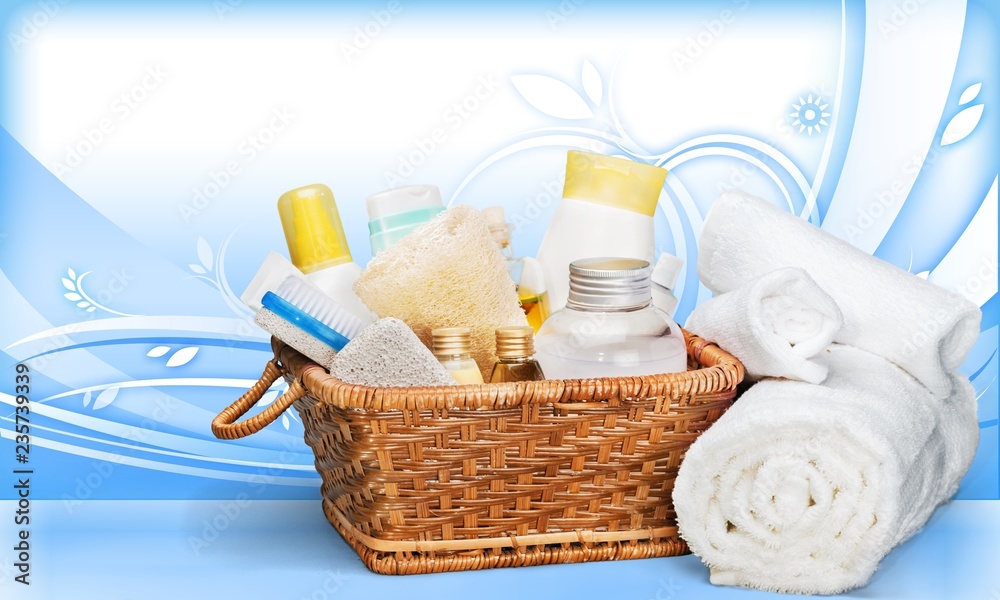 Bath towel and basket with accessories for spa on blur