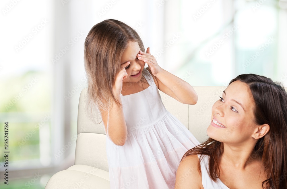 Happy Mother and daughter hugging