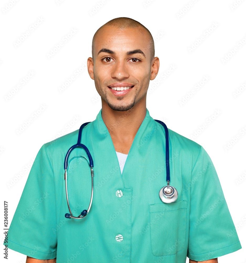 Portrait of young handsome man doctor isolated on white