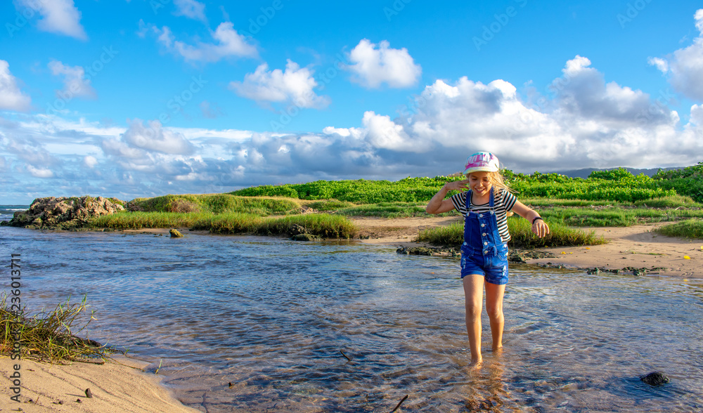 Little Girl Playing in Nature