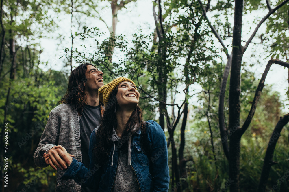 Loving couple in rain forest