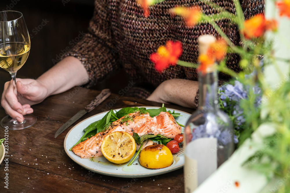 Grilled salmon filet with fresh greens