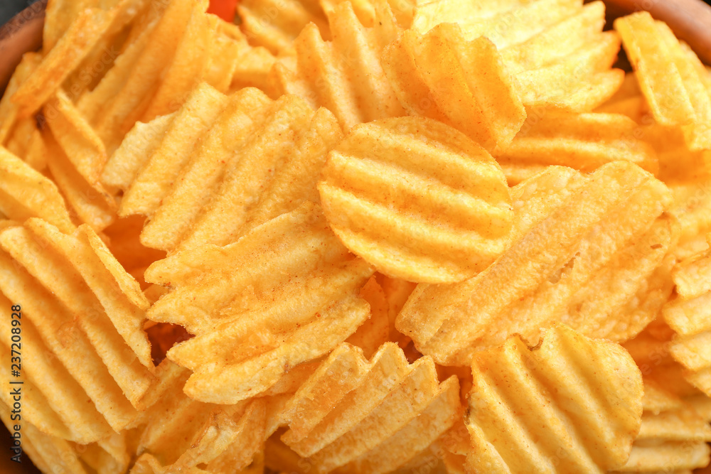 Tasty crispy potato chips, closeup