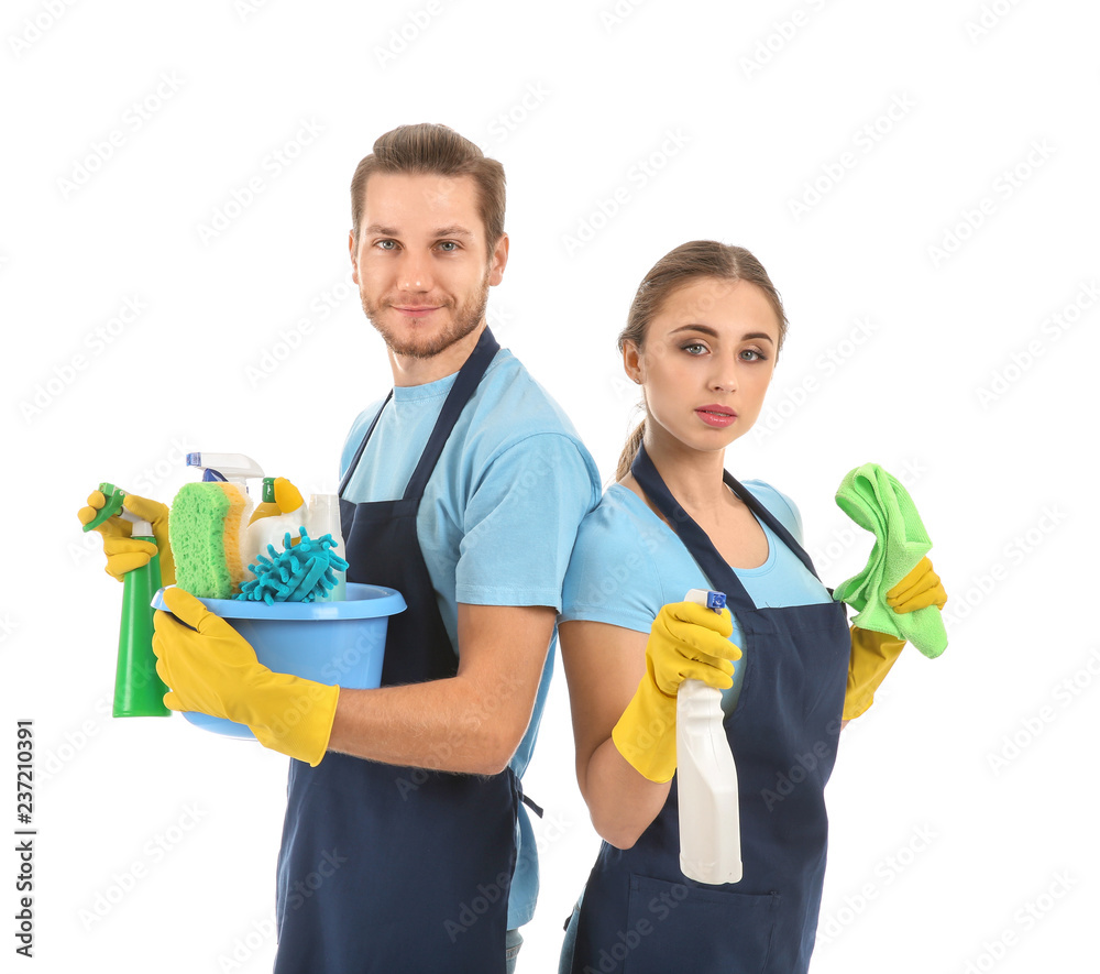 Man and woman with cleaning supplies on white background